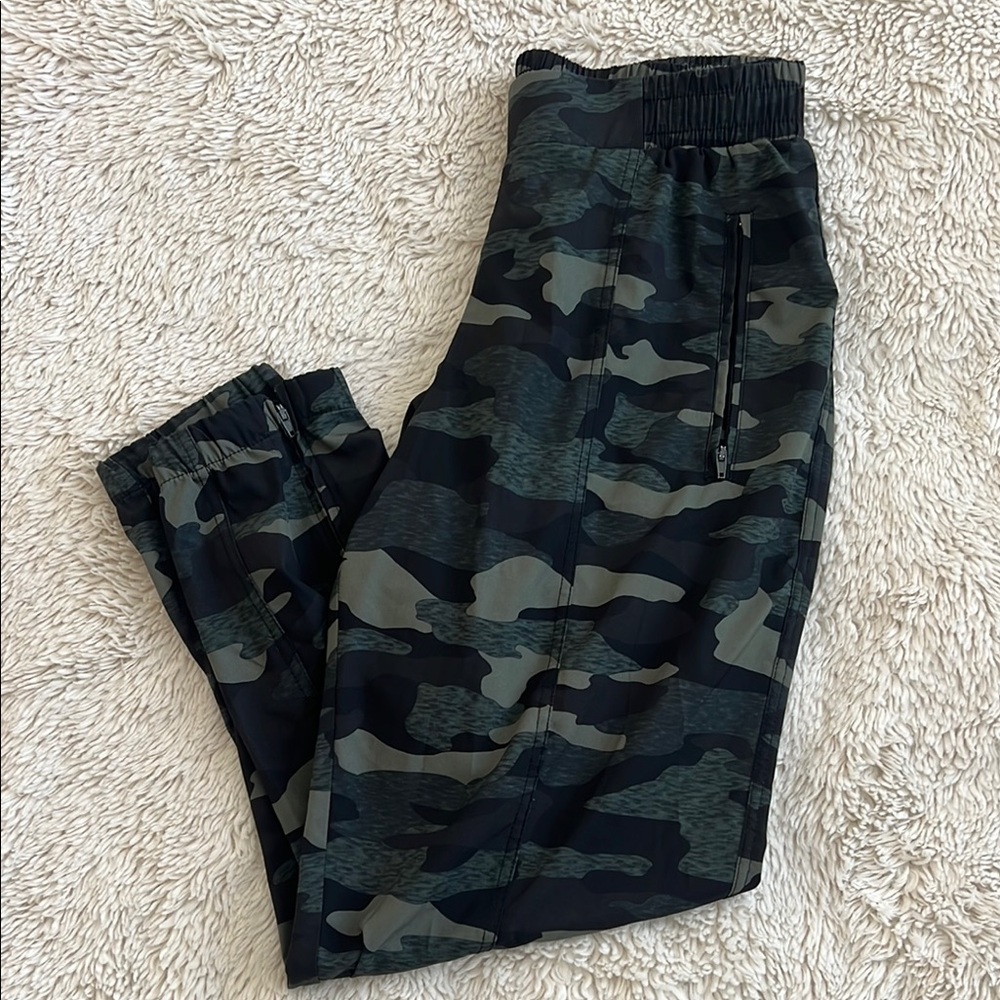 Women’s camo track pants. Swishy Athletic material.
